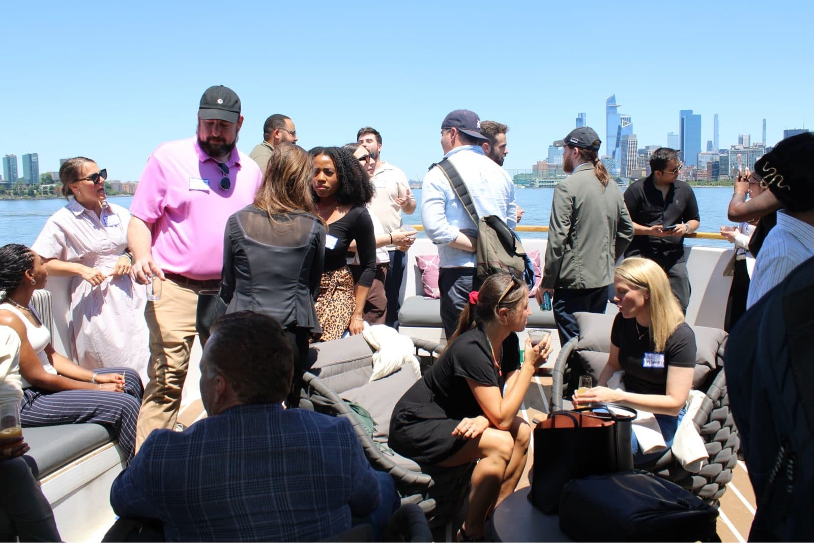 Heartland Venture Summit guests connecting on a yacht deck in New York